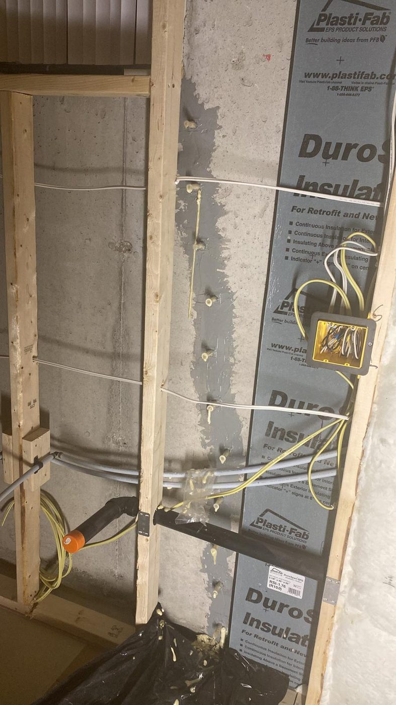 Foundation wall crack injection repair in progress