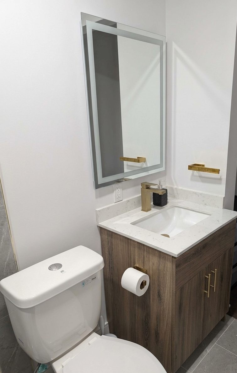 Bathroom vanity with new sink and faucet installed